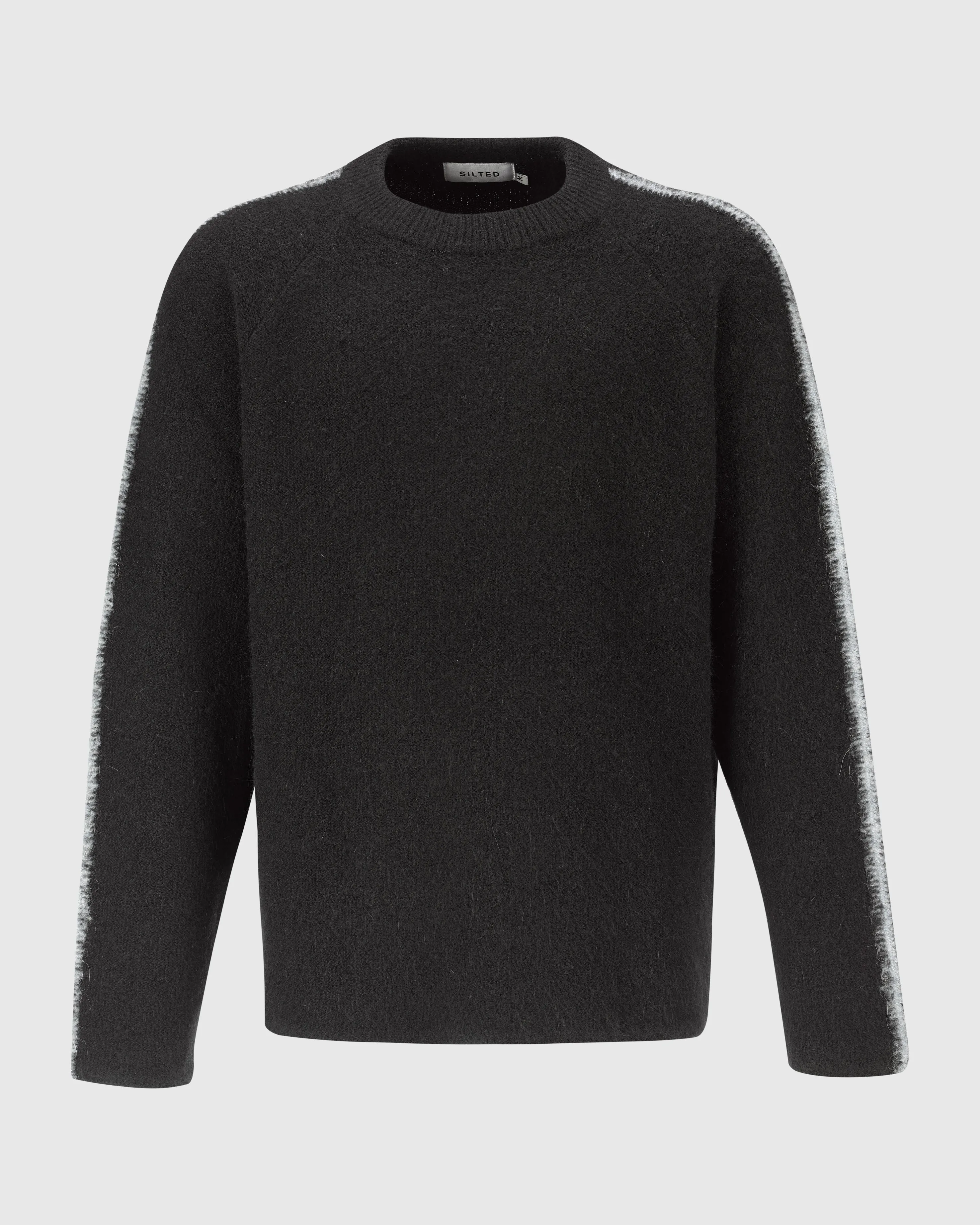 SCAR SWEATER IN BLACK